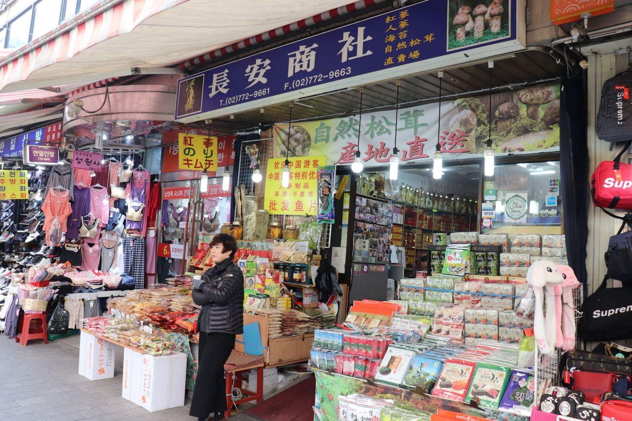 Final steps towards Jangan Store in Namdaemun Market, with visible exterior storefront.